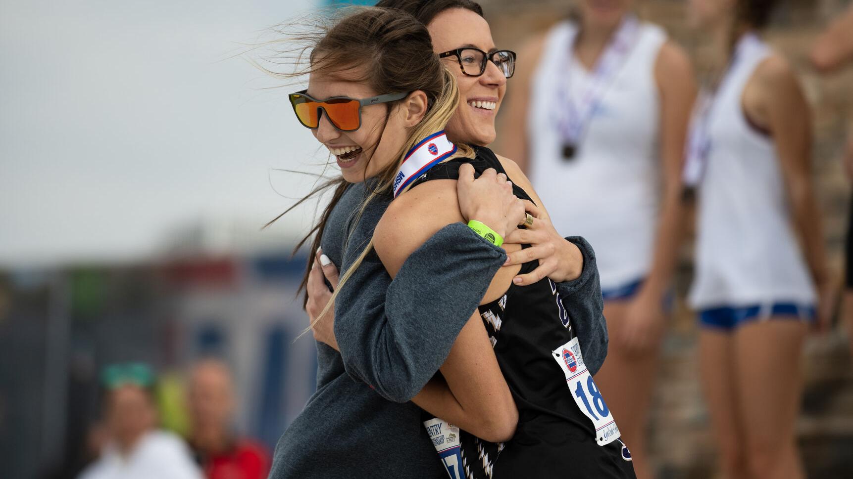 Troy's Boessen, Civic Memorial's Peal juggle coaching while training for Boston Marathon